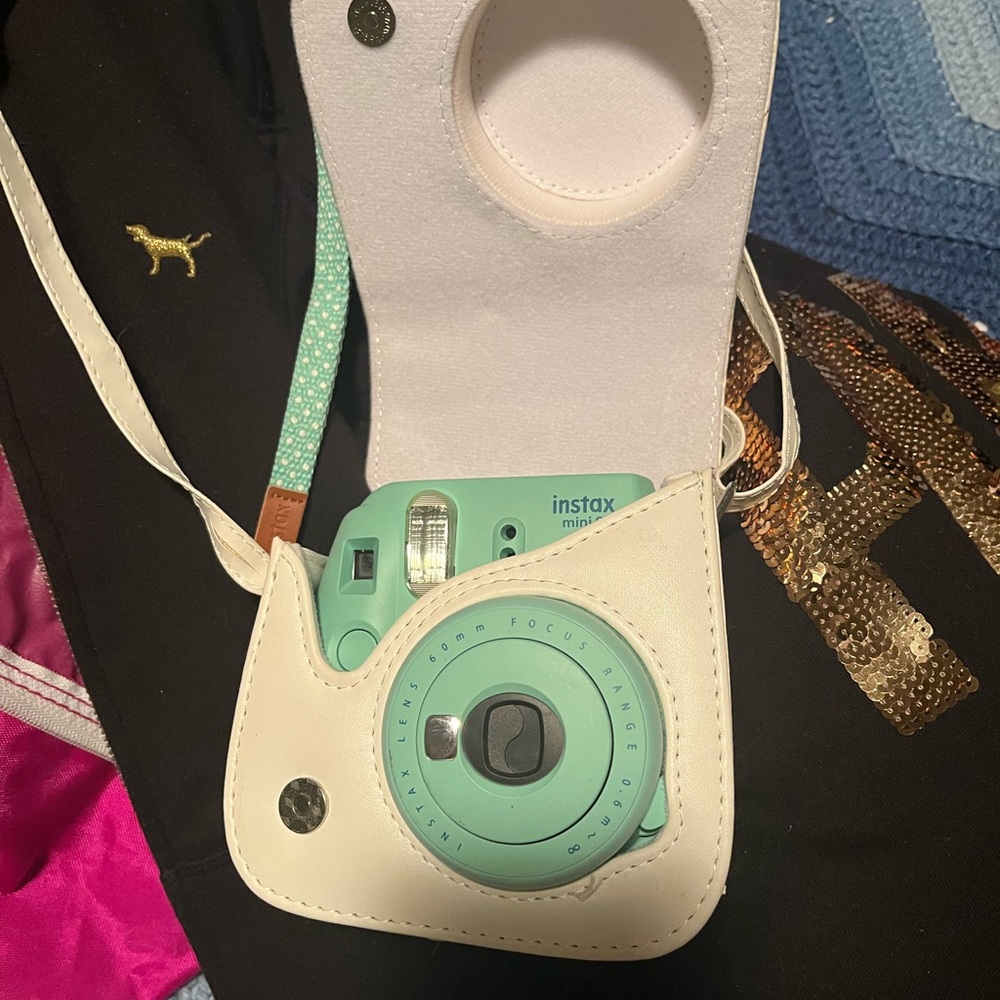 Mint green instax mini 9 instant picture camera